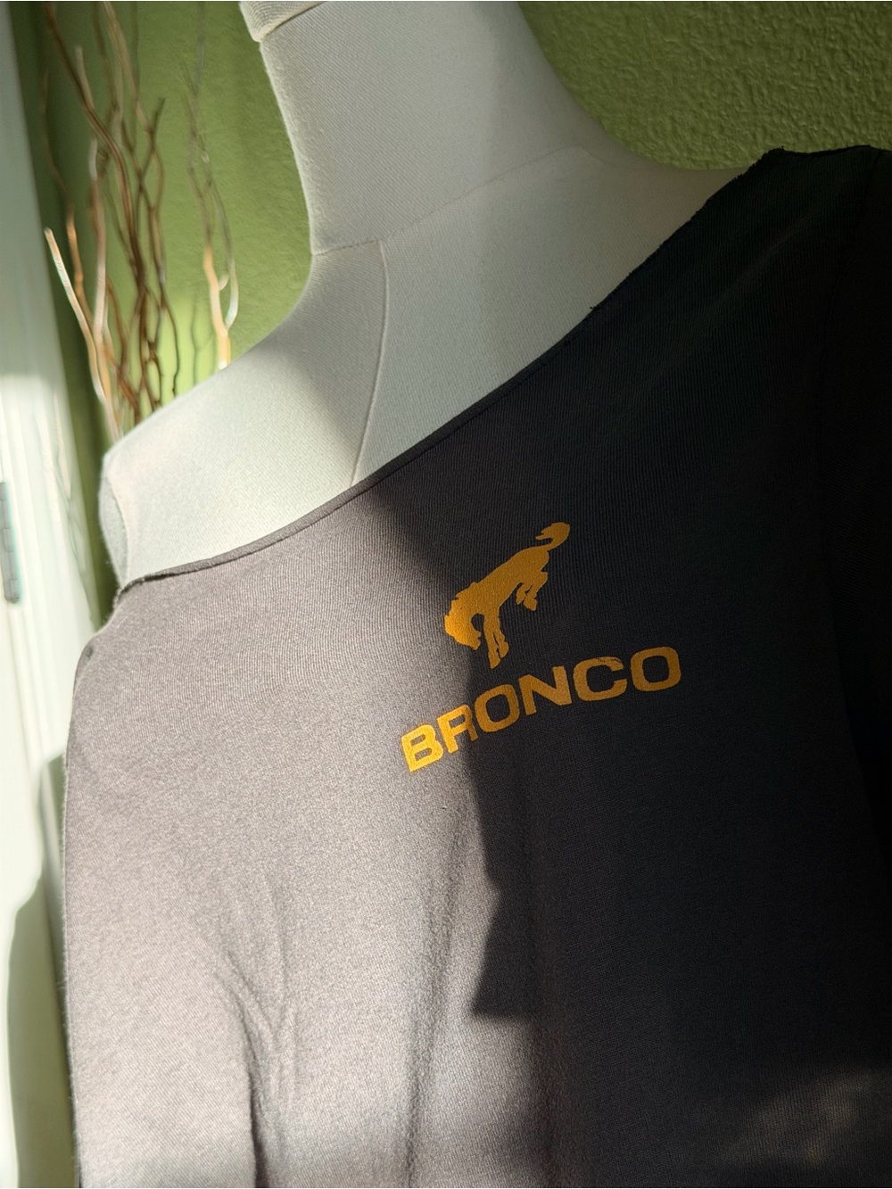 Bronco Logo Off-Shoulder Tee in Mustard on Black